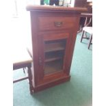 A mahogany pot cupboard with glazed door and single drawer to top.