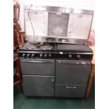A Newhome electric range cooker with extractor hood.