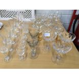 A large collection of glass including two Toastmaster glasses and a dinner and tea service