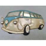 A piece of wall art depicting a campervan.