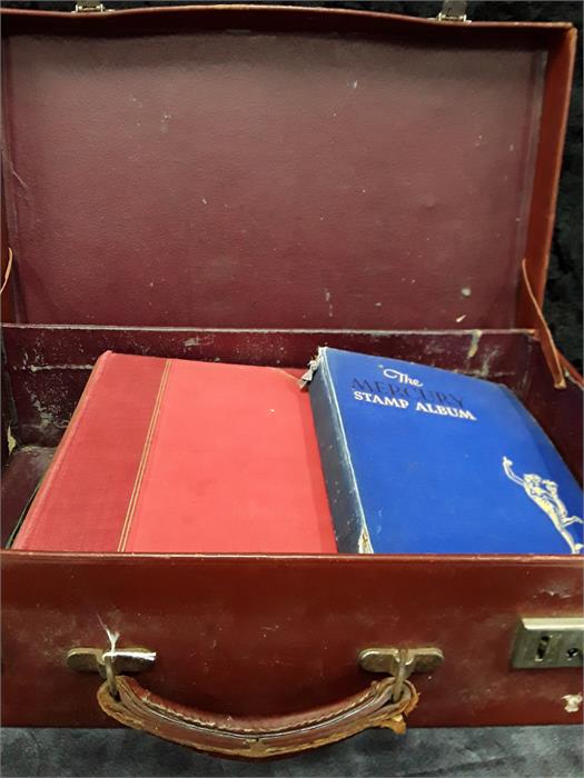 A suitcase of stamp albums.