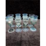 A set of Eight Victorian James Powells/Whitefriars blue to cream opalescent wine glasses.