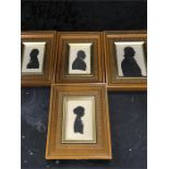 Four Victorian design silhouettes in Maple frames. dated on back