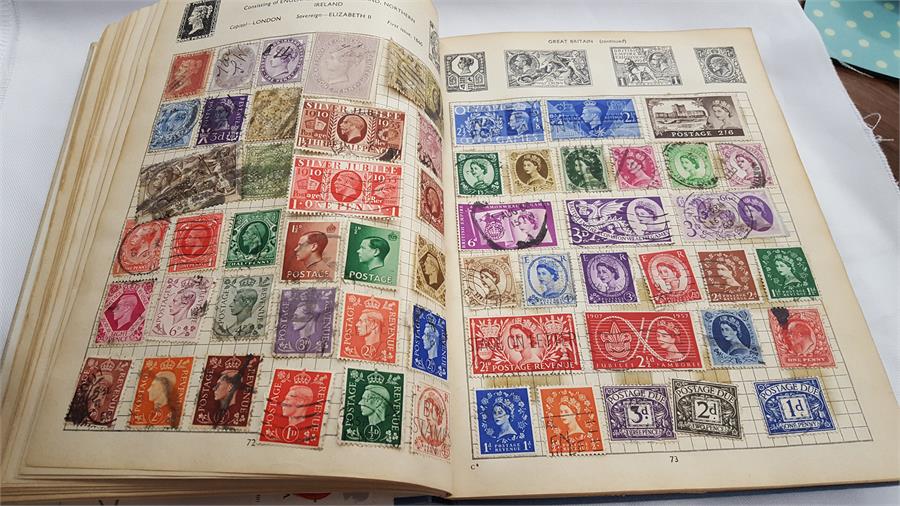 A box containing a large amount of world stamps.
