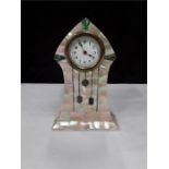 An Art Nouveau pearl and abalone shell dressing table clock.