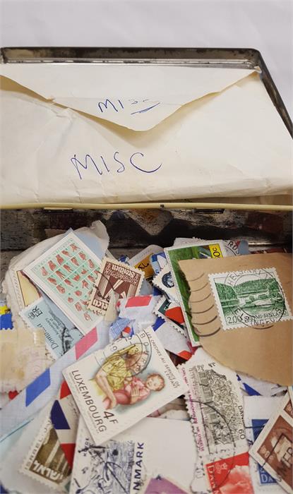 A box containing a large amount of world stamps. - Image 10 of 10