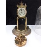 An anniversary clock with glass dome