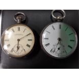 Two silver engraved cased pocket watches