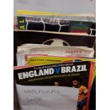 A collection of football programmes to include England V Brazil, England V Scotland etc.