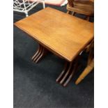 A 1970's teak nest of three tables.