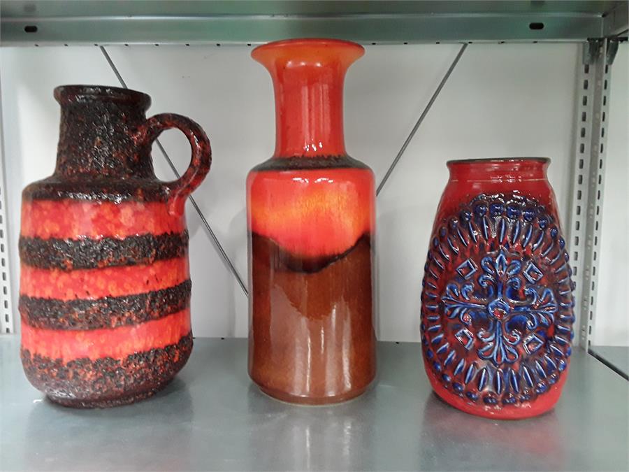 Three items of German red orange and blue 60's pottery.