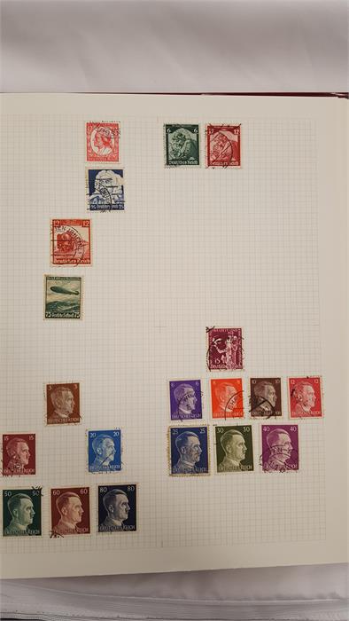 A red album of mainly German stamps. - Image 2 of 2