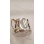 A Tiffany & Co. silver double handle cup (138.9 grams).