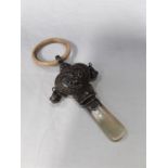 Silver hall marked Simple Simon child's rattle ivory ring and mother of pearl teether