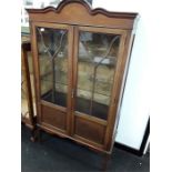 A Edwardian Mahogany and inlaid double door china display cabinet.