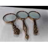 Three brass mounted magnifying glass