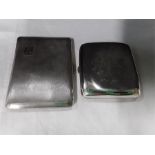 Two silver cigarette cases