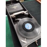 A Columbia Grafonola portable Gramophone. Model No: 109A with two records (af).