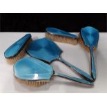 Silver dressing table set in blue enamel