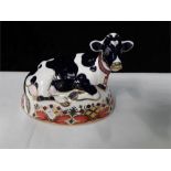 Royal Crown Derby paperweight Freesan calf buttercup.