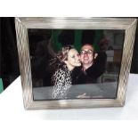 A large silver reeded design photo frame. 12 inches x 10 inches.