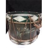 A drum with side straps