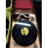 A Decca 50 wind up portable Gramophone from 1950 with two boxes of 78's.