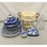 A selection of blue & white chinaware with a decanter and Crown Devon planter.