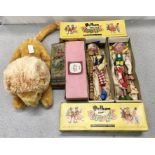 Two Pelham Puppets, a soft toy lion and a couple of vintage boxes.