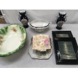 A selection of china trays and dishes, with two pictures