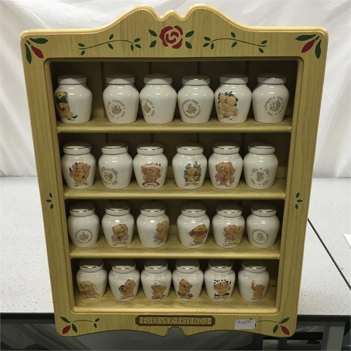 Five cabinets of thimbles together with a Forever Friends spice rack.