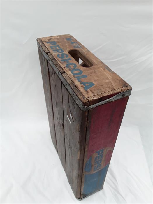 A Pepsi-Cola wooden crate.