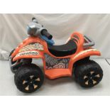 A child’s battery operated quad bike.
