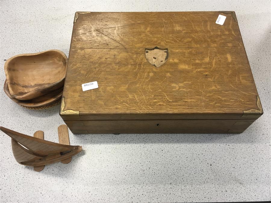 A cutlery canteen by John Nowill & Sons together with various wooden items.