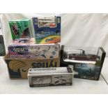 A box of toy helicopters and a submarine