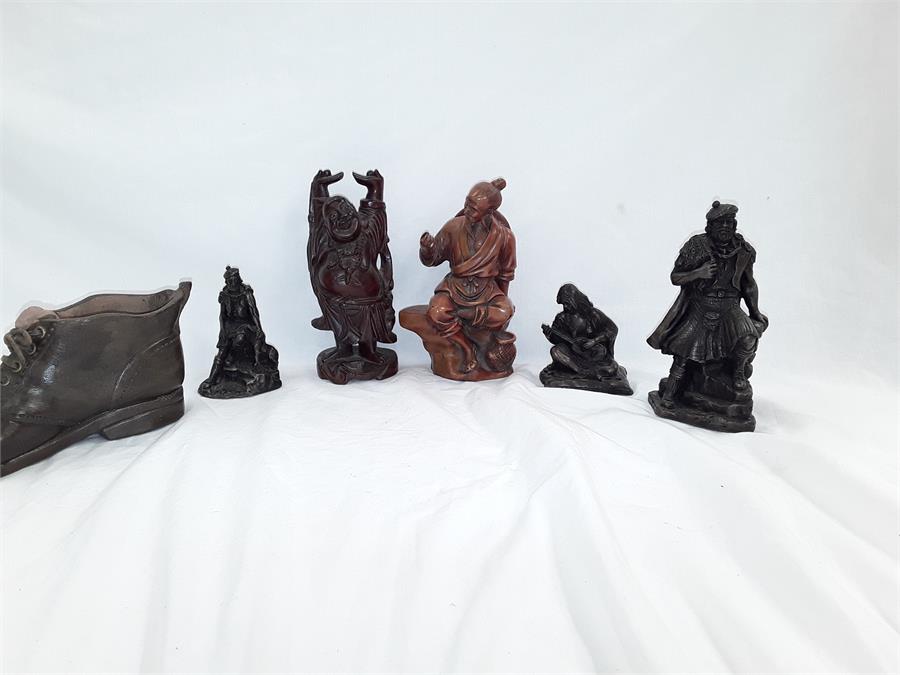 Various figures: a Buddha, three John Letts sculptures to include resin.