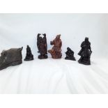 Various figures: a Buddha, three John Letts sculptures to include resin.