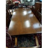 An old charm dining table with six matching chairs.