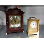 A modern mahogany cased Georgian design clock with brass chapter ring and a gilt cased bedroom