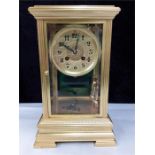 A late 19c french design brass 4 plate time piece with mercury pendulum please note export rules out