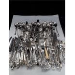 A quantity of Kings pattern and other silver plate cutlery, silver handled desert forks etc.