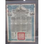 A 1913 government war bond in blue for £100 issued by the Chinese government framed