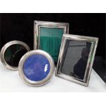 Four silver plate photo frames