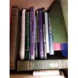 A box containing collectors books