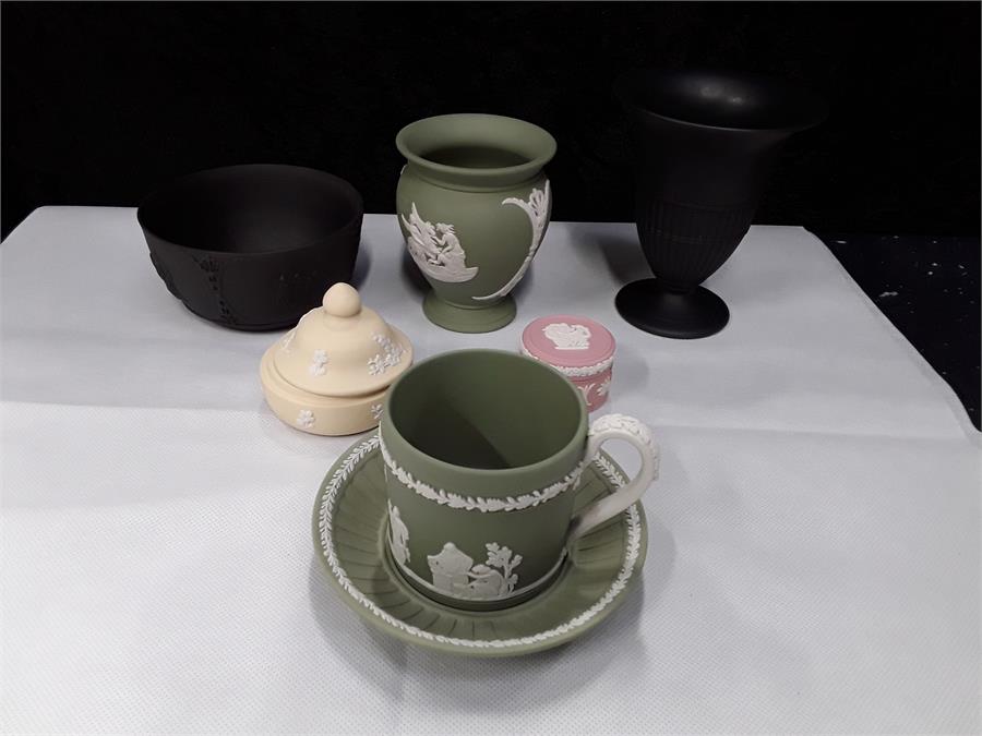 Wedgwood Jasper coloured china to include green cup and saucer, lidded pot, pink box and three other