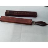 A strop razor sharpener in leather case