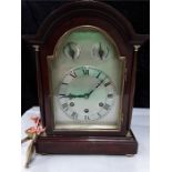 A Mahogany cased bracket clock west /whit/ silent with pendulum and key