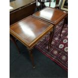 A pair of American mahogany side tables on carved shaped legs.