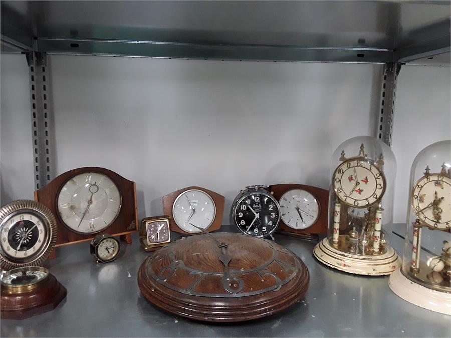 A quantity of clocks including an oak cased office, 2 anniversary, W. Wehrle, alarm, 60s etc