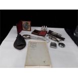 Two Ambrotype photographic miniatures in cases with other collectables watch, tongs, shot flask, etc